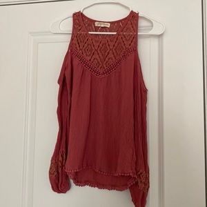 Rewind long sleeve shirt with shoulder cut outs. Size XS.